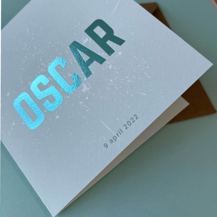 Uniek oceaan blauw foliekaartje voor jongen Oscar